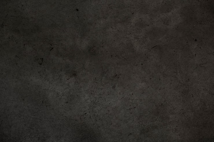 Dark textured concrete wall background | Al Janah Al Malaky