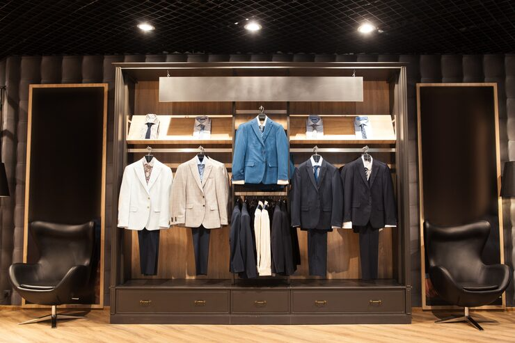 A men's business suits display in a store | Al Janah Al Malaky