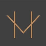 A minimalist logo with the letters M and H combined | Al Janah Al Malaky